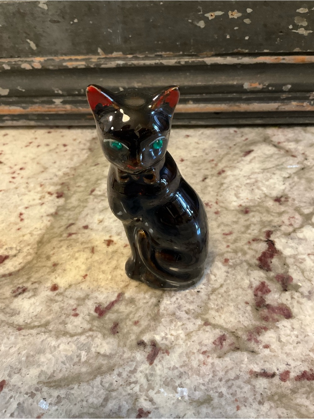 Black Ceramic Cat Figurine with Green Eyes